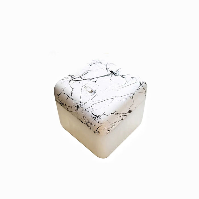 White marble Flipping Cubic Timer Lamp, a square LED lamp with a unique flip-to-operate design.