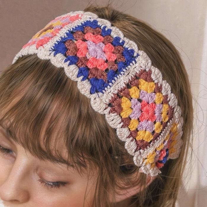 Model wearing a Floral Crochet Hairband with white trim, great for everyday styling and gifting.