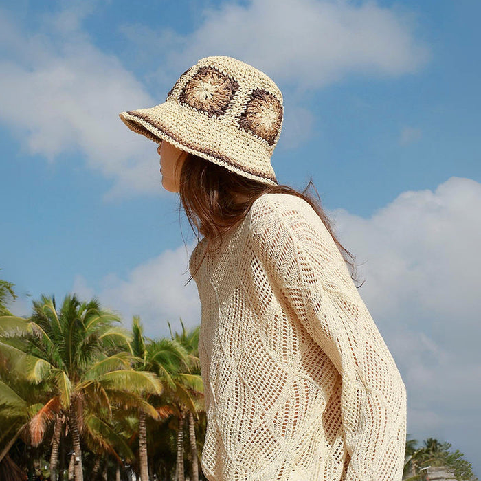 Back view of model wearing beige Floral Straw Hat, showcasing natural straw weave and delicate floral trim.