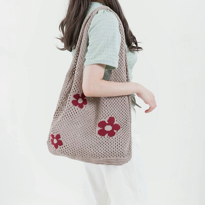 Model carrying a khaki Flowers Crochet Shoulder Bag on shoulder , easy for commuting and weekends.