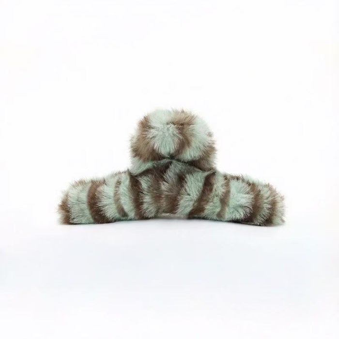 Folded view of Fluffy Striped Hair Claw in mint green , ideal for quick updos and ponytails.