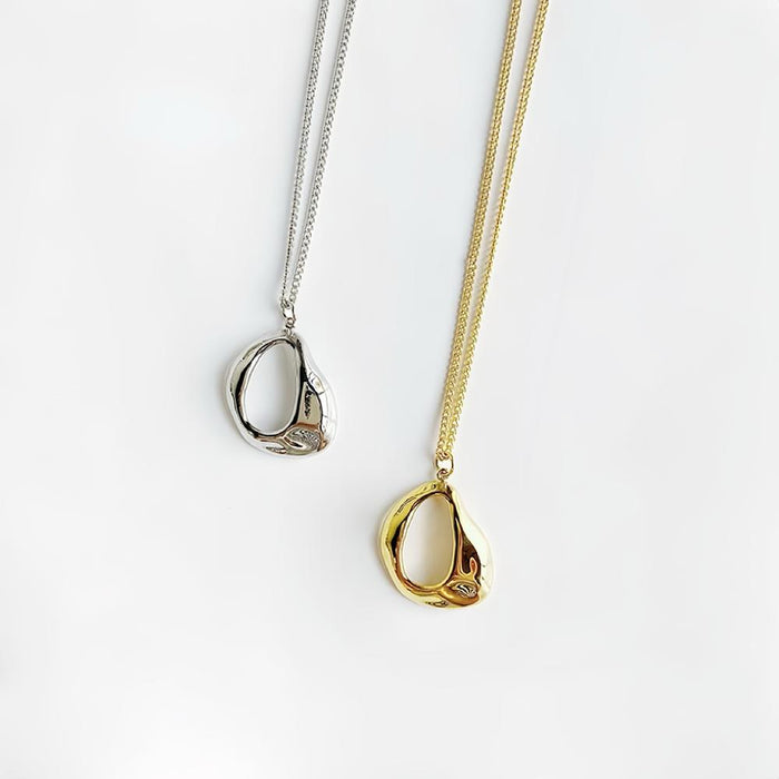 Front view of Fluid Shaped Pendant Necklaces in gold and silver , great for everyday outfits.
