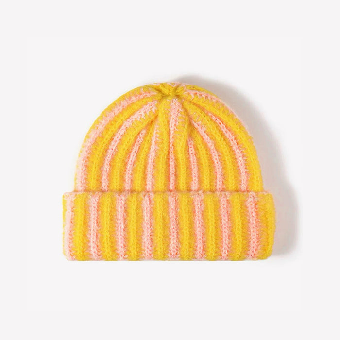 Close-up of the yellow and pink striped beanie showcasing the fuzzy texture.
