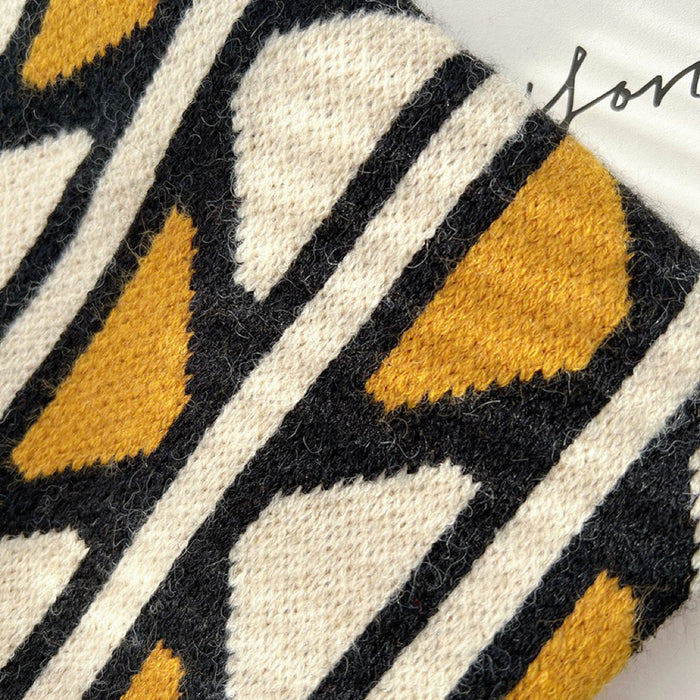 Detail view of Geometric Contrast Color Knitted Tote Bag, showcasing the knitted fabric.