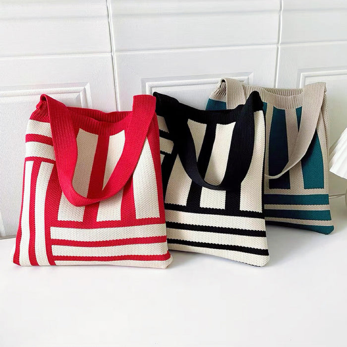 Front view of Three polyester knitted bags with geometric lines: red and white, black and white, and viridian and beige.