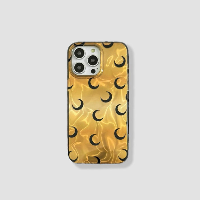 Black crescent moon pattern on a shimmering gold background silicone iPhone case. Celestial aesthetic.