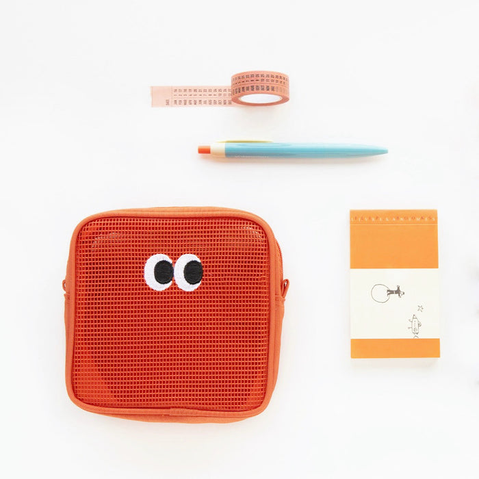 Orange Googly Eyes cube mesh pouch with embroidered eyes; compact zip organizer for stationery or cosmetics.