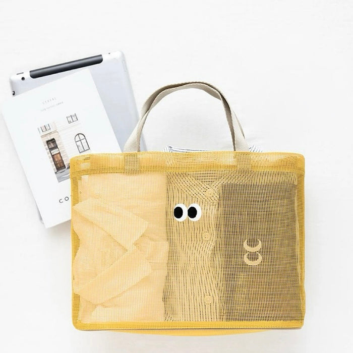 Front view of yellow Googly Eyes Mesh Tote Bag, easy for commuting and weekends.