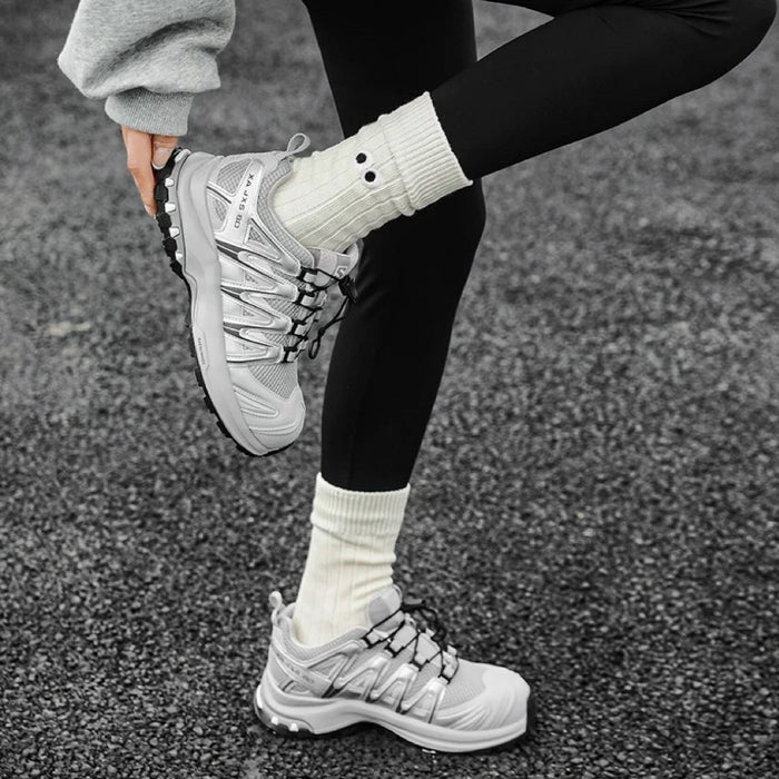 Model wearing Googly Eyes Socks in white, great for daily wear and lounging.