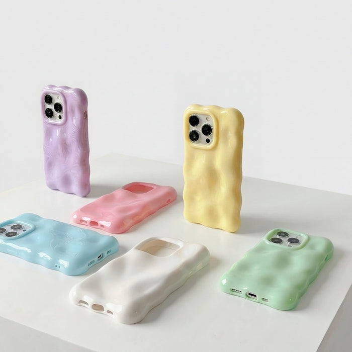 Aesthetic 3D textured melting effect phone covers displayed in a variety of trendy shades.