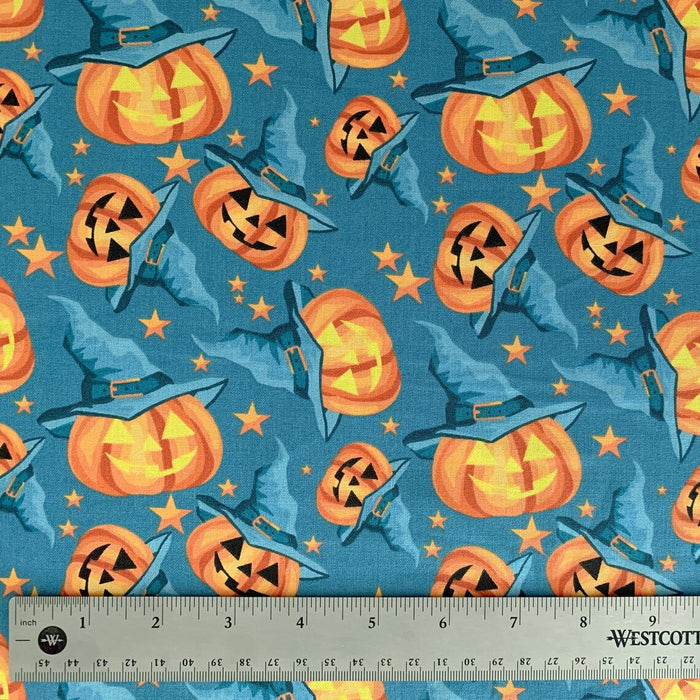 Halloween Fabric Smiling Pumpkins Jack o Lantern on Blue by the yard