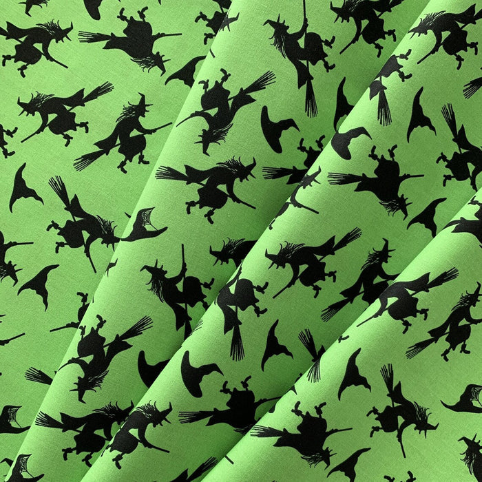 Halloween Flying Witches on Broomsticks on Green 100% Cotton Fabric