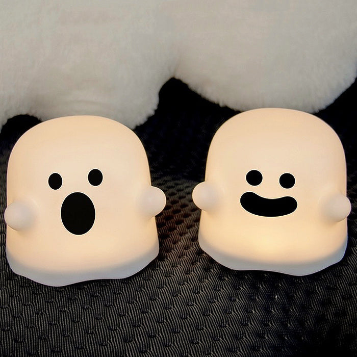 Two Halloween Ghost Lamps shown together, one with smile face and one with surprise face.