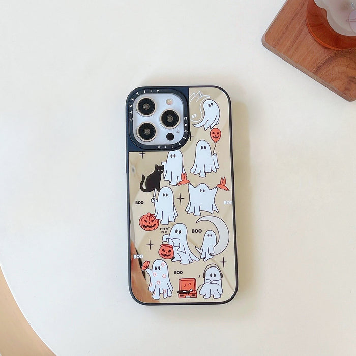 Halloween Mirror Boo Case for iPhone featuring shiny gold silicone back with playful festive ghosts.