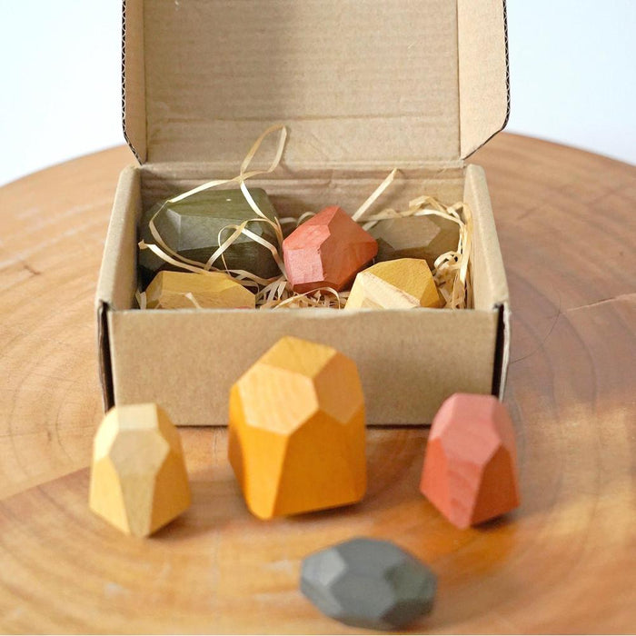 Close-up of Handmade Beech Stacked Stones in a paper box.