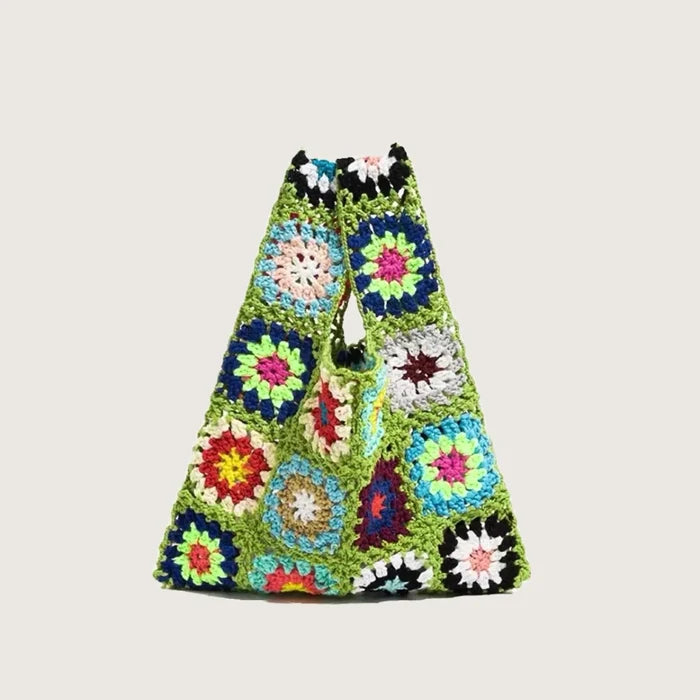 Close-up of Handmade Crochet Flower Grid Bag in green, easy for commuting and weekends.