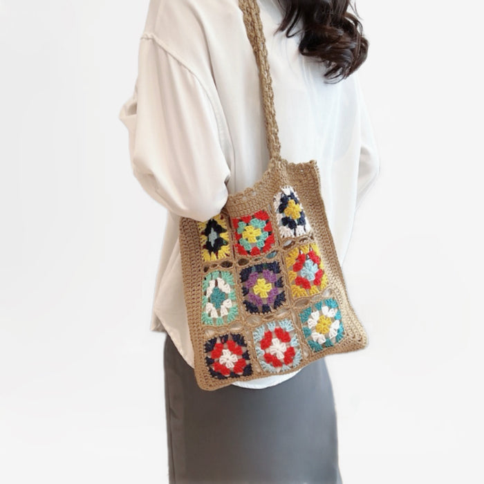 Model carrying a khaki Crochet Flower Grid Shoulder Bag, easy for commuting and weekends.