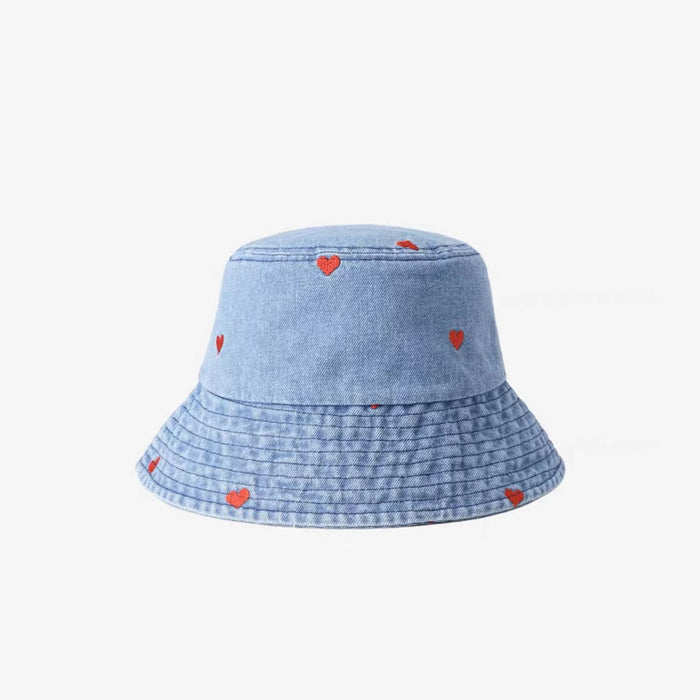 Front view of Heart Printed Bucket Hat in light blue, featuring durable denim and romantic heart prints for summer.