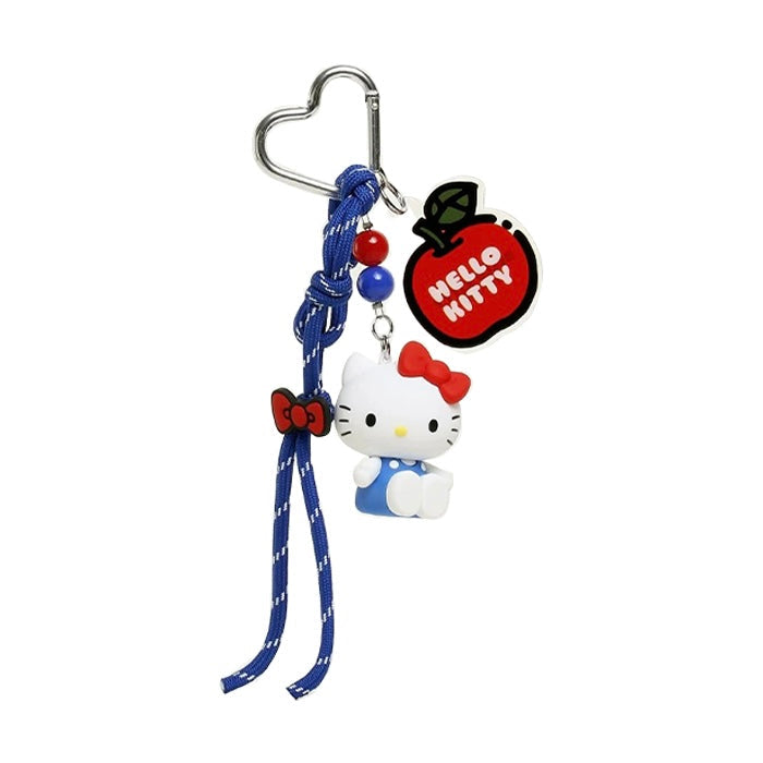 Flat lay of Hello Kitty Bag Charm with rope and heart-shaped keyring, easy for gifting and photo-ready styling.
