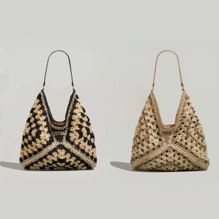 Two holiday style straw tote bags shown together. One is black and natural raffia, the other is all natural raffia.