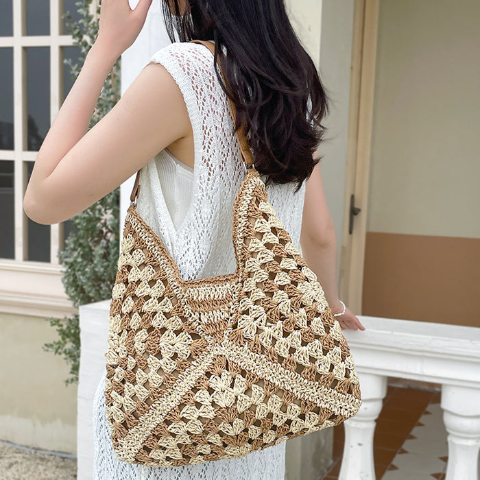 Model carrying a khaki Holiday Style Straw Tote Bag on the shoulder, easy for commuting and weekends.