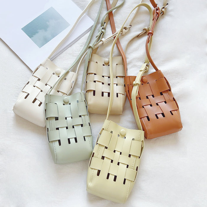 Front view of Five PU leather crossbody bags in white, mint green, cream, light yellow, and brown with a hollow woven.