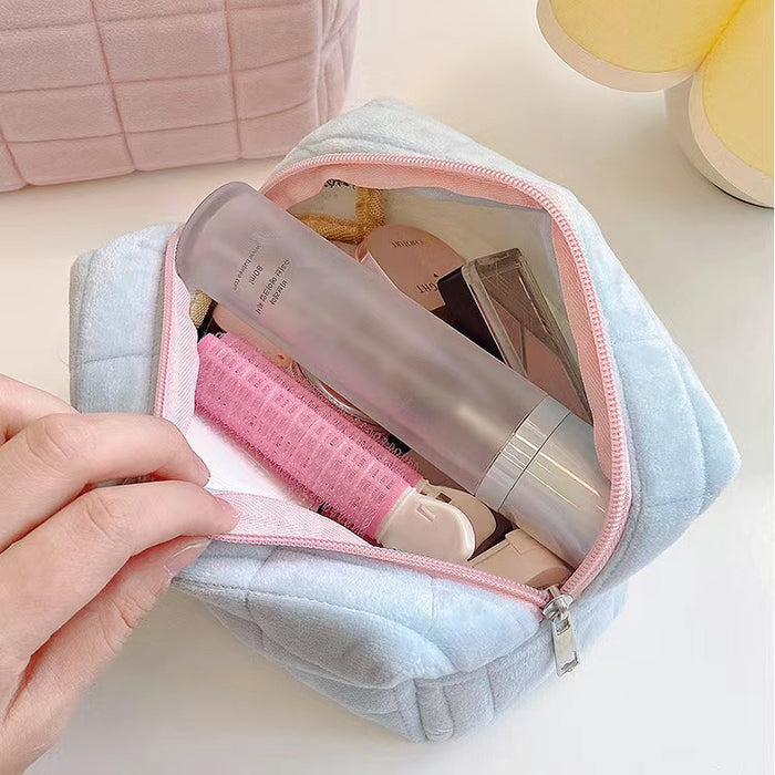 Angled view of Icecream Makeup Bag, showcasing the interior.