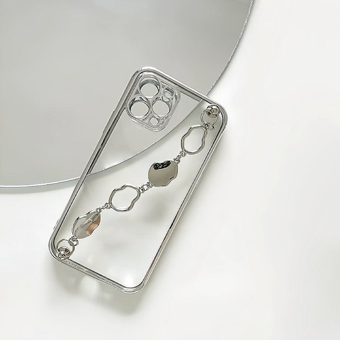 Clear silicone iPhone case with an irregular silver metal chain strap. Edgy portability fashion.