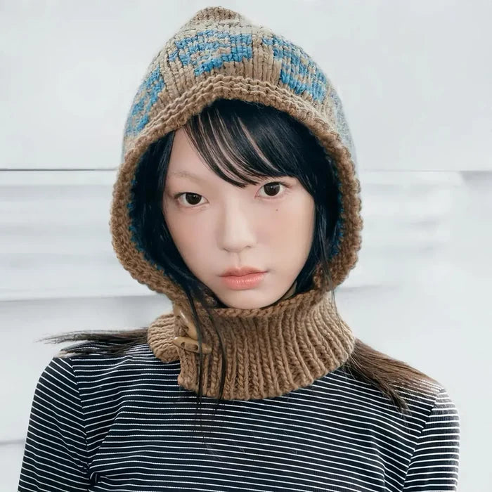 Model wearing Jacquard Knitted Balaclava in khaki, showcasing fine natural wool and detailed jacquard craftsmanship.