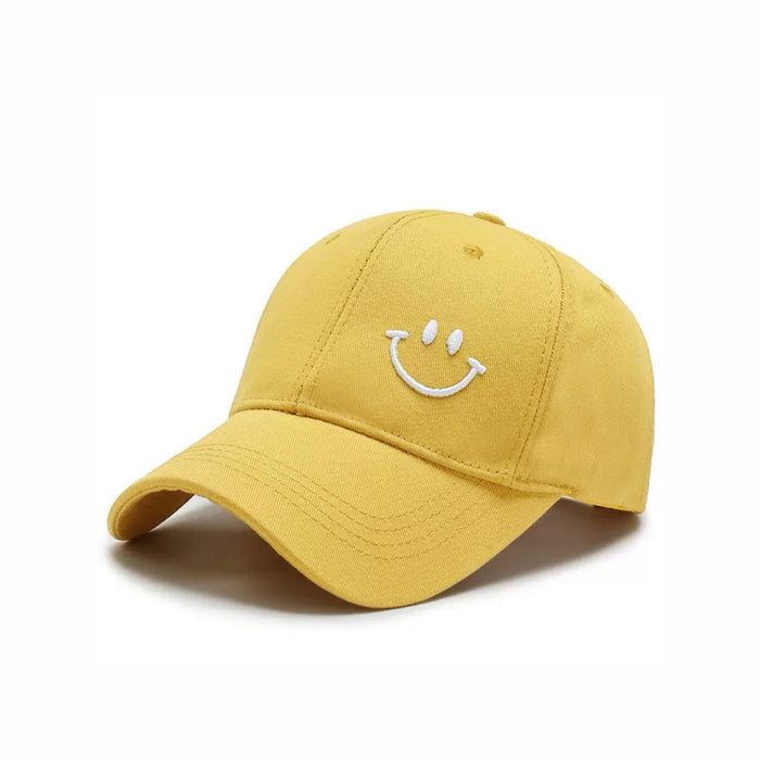 Front view of Joyful Grin Cap, displays iconic smile graphic embroidered on soft, breathable cotton for comfort.