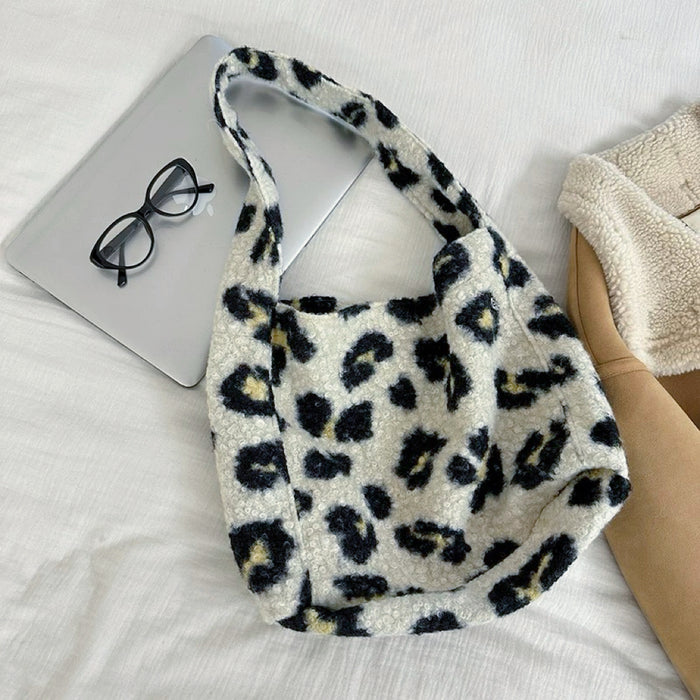 Flat lay of Leopard Print Tweed Tote bag in beige, great for everyday carry and travel.