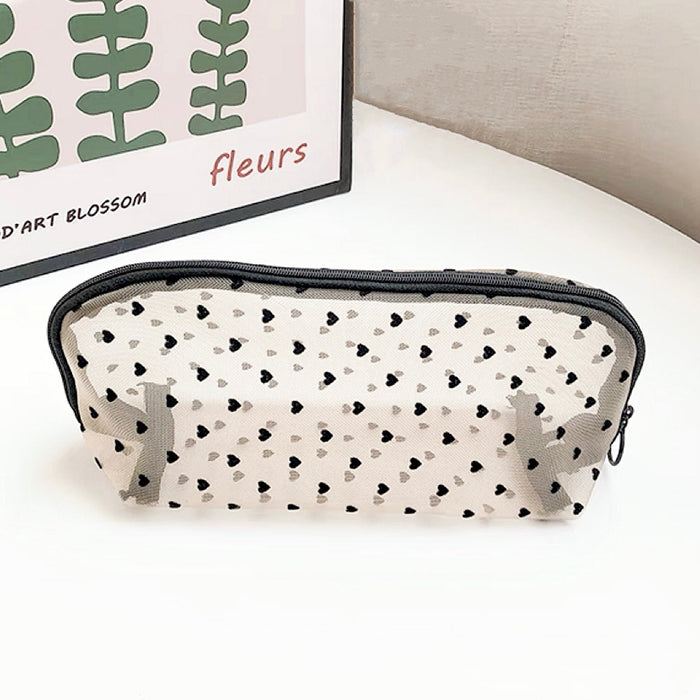 Semicircle organza bag for brushes and pens; minimalist coquette style accessory.