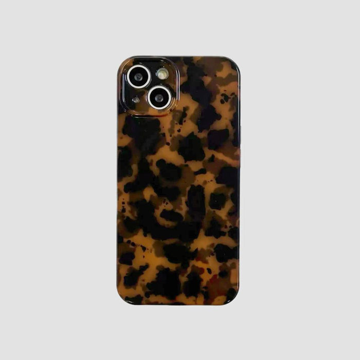 Maillard Amber silicone iPhone case with a tortoiseshell pattern. Classic dark academia aesthetic.