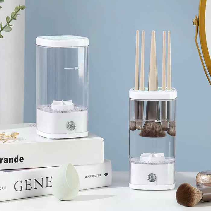 Front view of White and clear ABS automatic makeup brush cleaner with brushes inside, next to a similar empty unit.