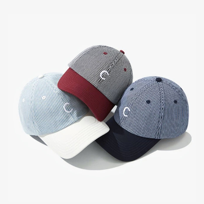 Front view of Mash Up Stripe C Cap, showcasing eclectic striped patterns on premium breathable cotton fabric.