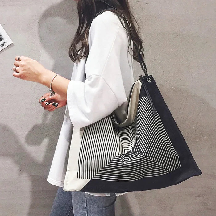 Large nylon tote with an artistic maze design, perfect for casual city styling.