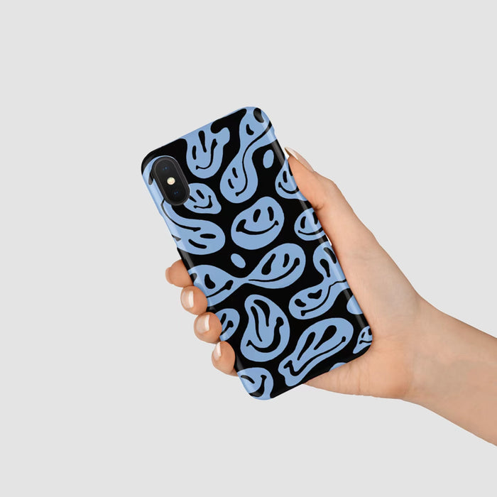 Model holding Melting Smiling Face Case. Creative warped graphic on a durable and flexible silicone frame.