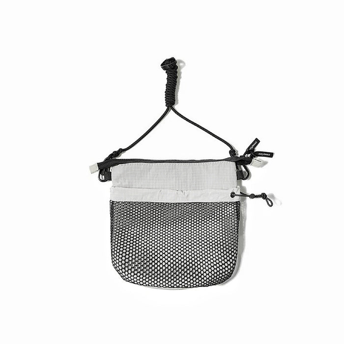 Folded view of Mesh Vogue Crossbody Bag in gray, easy for commuting and weekends.