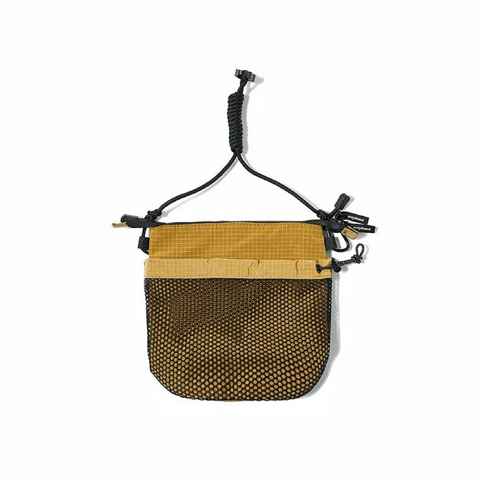 Angled view of Mesh Vogue Crossbody Bag in khaki, great for everyday carry and travel.