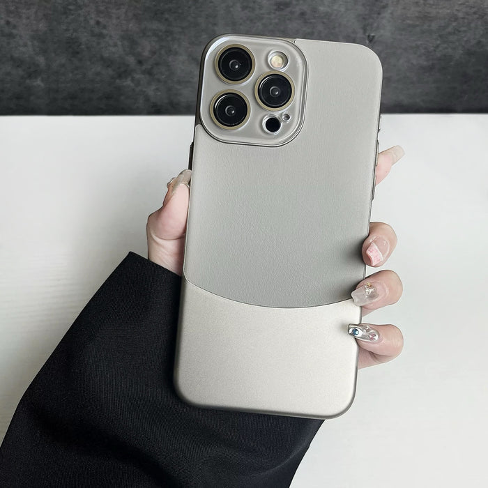 Model holding Metal Leather Splicing Case. Contemporary mix of metallic accents and soft faux leather.