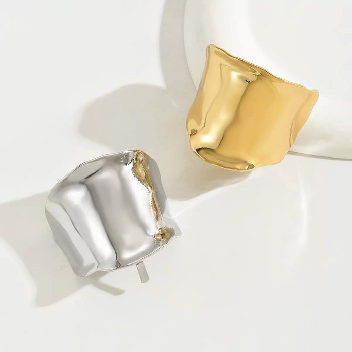 Angled view of two Metallic Wave Hair Cuff  in gold and silver , ideal for quick updos and ponytails.