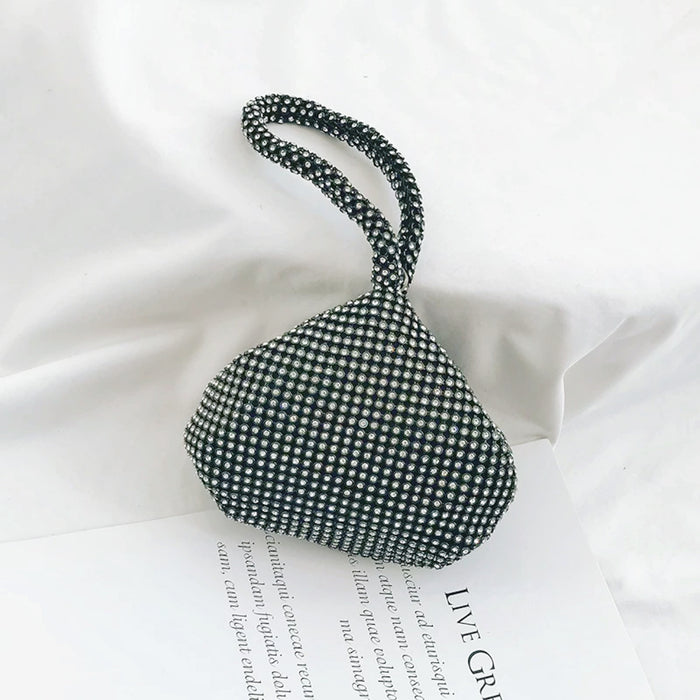 Flat lay of Mini Diamond Party Handbag in black, great for everyday carry and travel.
