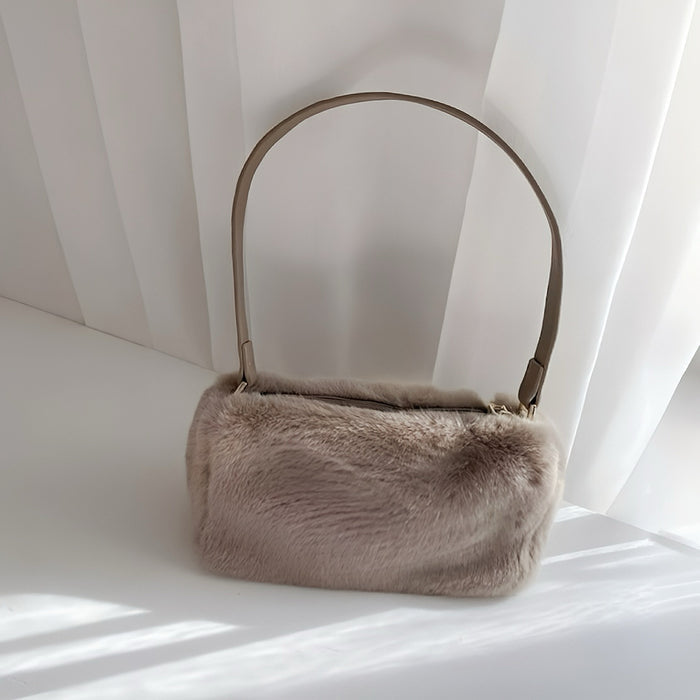 Angled view of Mini Shearling Baguette Bag in khaki, great for everyday carry and travel.