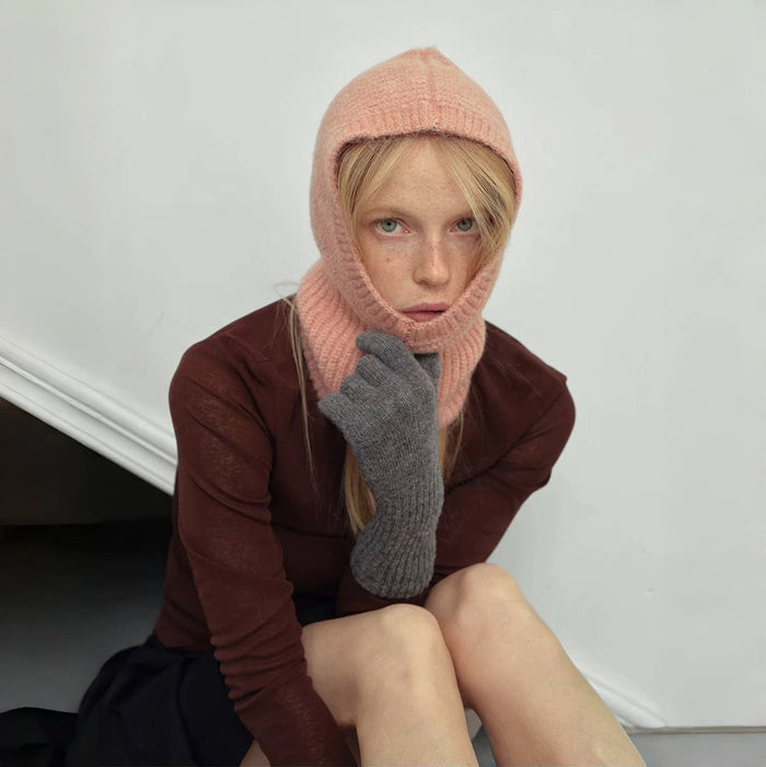 Model wearing Morandi pink knit wool blend balaclava, providing full head and neck coverage for winter.