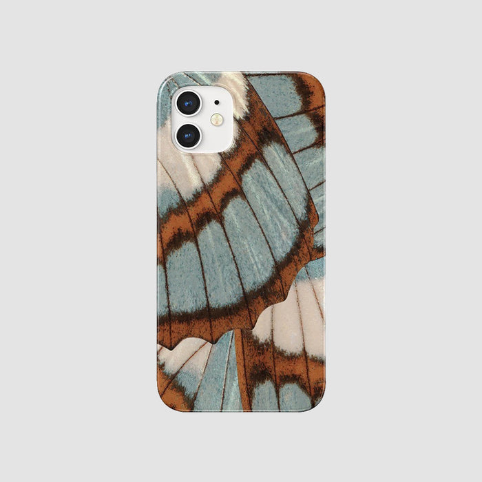Acrylic Morpho Flair case with blue, brown, and white butterfly wings. Iridescent nature-inspired design.