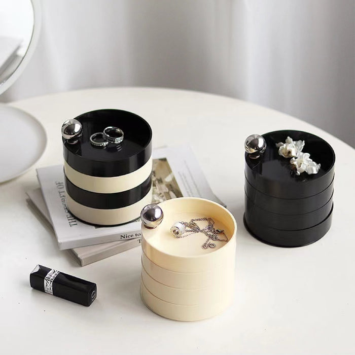 Front view of three colors of Multilayer Makeup Storage Boxes shown together.
