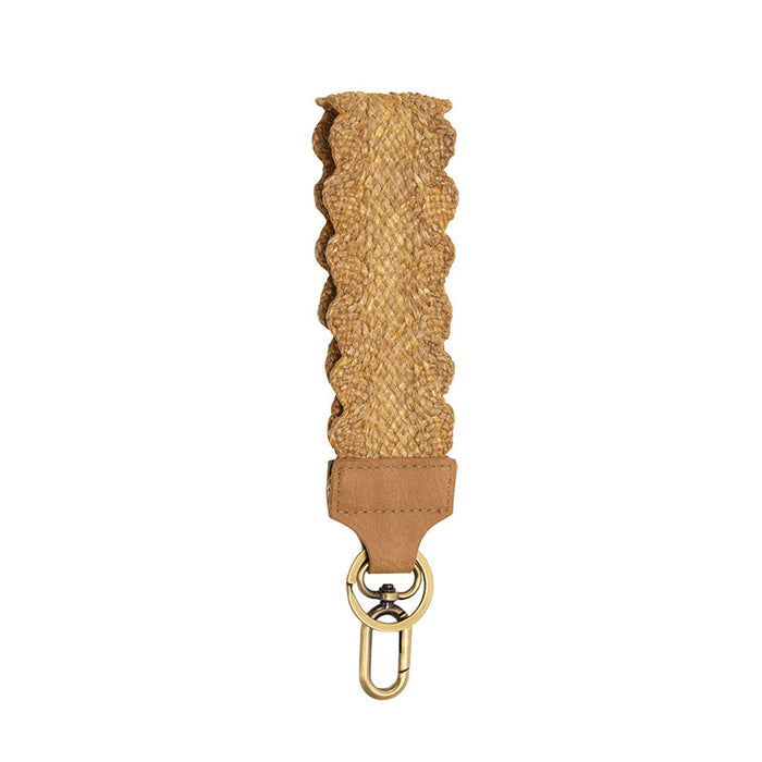 Textured beige strap with leather accent and gold clasp on a white background