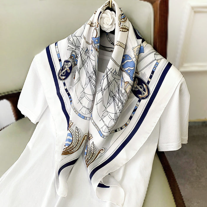 Close-up of a satin scarf Nautical Chart Satin Square Scarf draped on a shirt, easy for weekend styling and gifting.