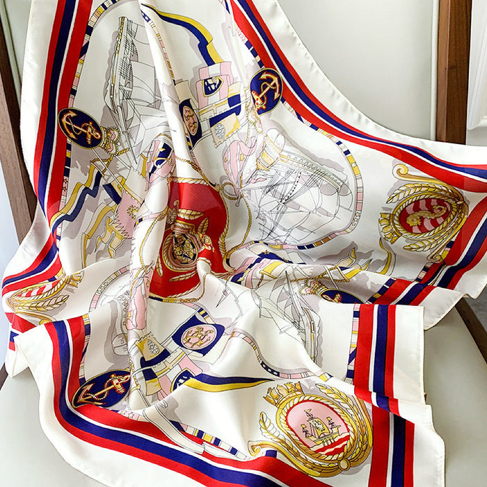 Folded view of Nautical Chart Satin Square Scarf in navy and red, vintage maritime aesthetic.