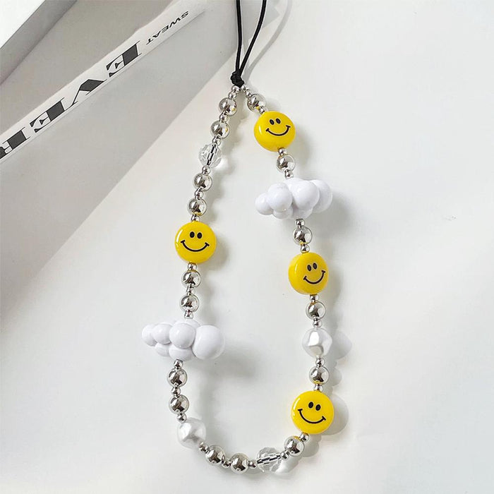 Detail view of Nice Day Phone Charm , easy to attach to bags and phones.